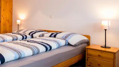 Ein Bett oder Betten in einem Zimmer der Unterkunft Christiania