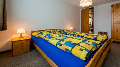 Ein Bett oder Betten in einem Zimmer der Unterkunft Christiania
