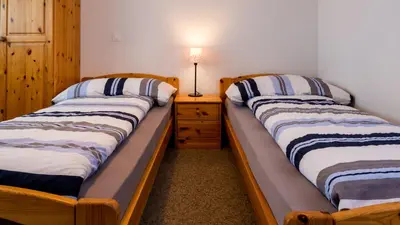 Ein Bett oder Betten in einem Zimmer der Unterkunft Christiania