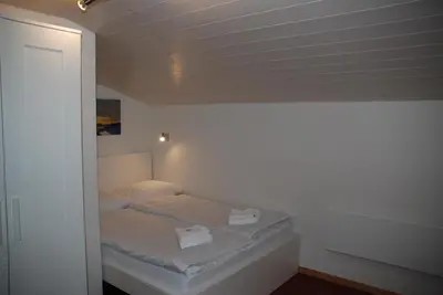 Ein Bett oder Betten in einem Zimmer der Unterkunft Family-Apartment Du Lac