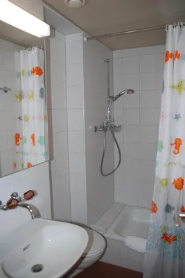 Ein Badezimmer in der Unterkunft Family-Apartment Du Lac