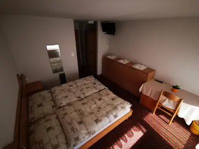 Ein Bett oder Betten in einem Zimmer der Unterkunft Hotel Restaurant Aletsch