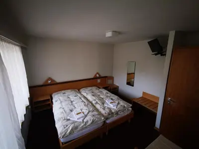 Ein Bett oder Betten in einem Zimmer der Unterkunft Hotel Restaurant Aletsch