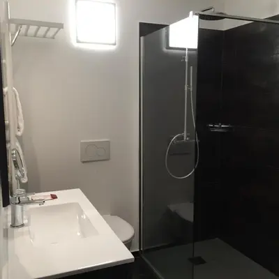 Ein Badezimmer in der Unterkunft Römerhof - Hotel with Self Check-in