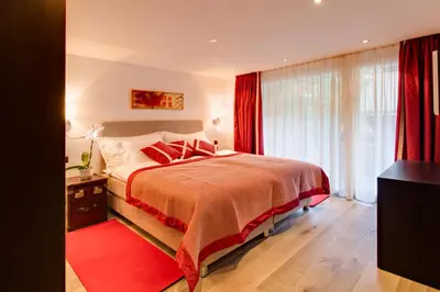 Ein Bett oder Betten in einem Zimmer der Unterkunft Alex Lodge Private Luxury Apartments