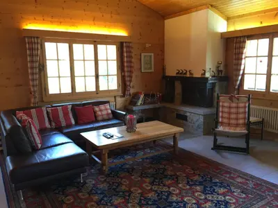 Ein Sitzbereich in der Unterkunft Chalet Charming