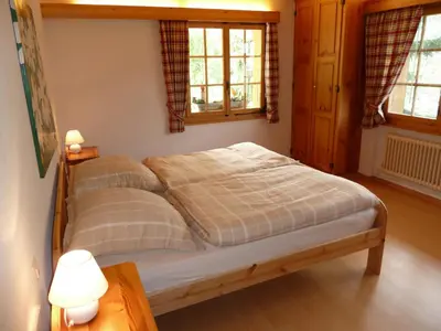 Ein Bett oder Betten in einem Zimmer der Unterkunft Chalet Charming
