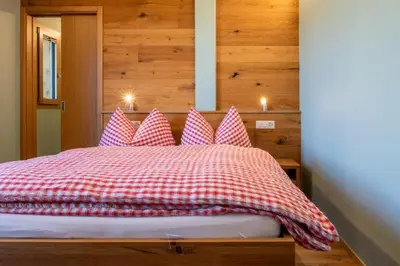 Ein Bett oder Betten in einem Zimmer der Unterkunft Berghotel Chäserstatt