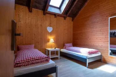 Ein Bett oder Betten in einem Zimmer der Unterkunft Berghotel Chäserstatt