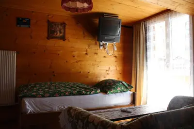 Ein Bett oder Betten in einem Zimmer der Unterkunft Haus Weideli, Dammstrasse 7