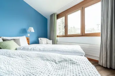 Ein Bett oder Betten in einem Zimmer der Unterkunft Ari Resort Apartments