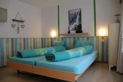 Ein Bett oder Betten in einem Zimmer der Unterkunft Pension Heino