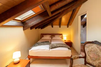 Ein Bett oder Betten in einem Zimmer der Unterkunft Locanda Villa d' Epoca
