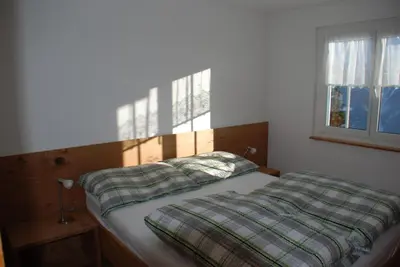 Ein Bett oder Betten in einem Zimmer der Unterkunft Chalet Foresta