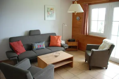 Ein Sitzbereich in der Unterkunft Chalet Foresta
