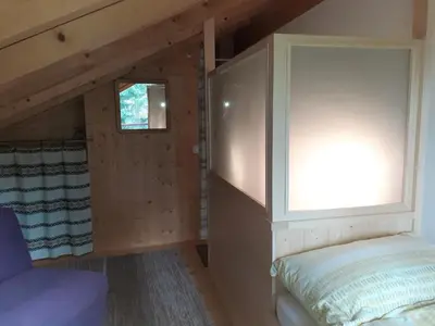 Ein Bett oder Betten in einem Zimmer der Unterkunft Les loulou 2