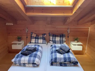 Ein Bett oder Betten in einem Zimmer der Unterkunft Haus Sapporo