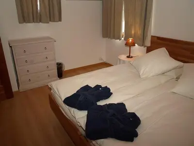 Ein Bett oder Betten in einem Zimmer der Unterkunft Chalet Huwi Zermatt