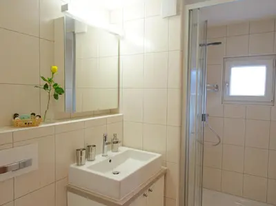 Ein Badezimmer in der Unterkunft Chalet Huwi Zermatt