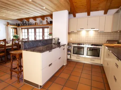 Küche/Küchenzeile in der Unterkunft Chalet Huwi Zermatt