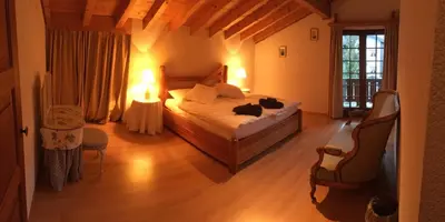 Ein Bett oder Betten in einem Zimmer der Unterkunft Chalet Huwi Zermatt