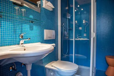 Ein Badezimmer in der Unterkunft BB Garni Motta