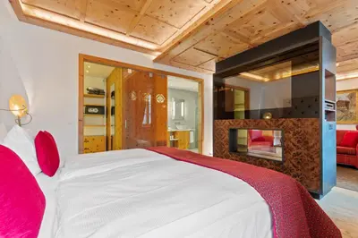 Ein Bett oder Betten in einem Zimmer der Unterkunft Grand Hotel Zermatterhof