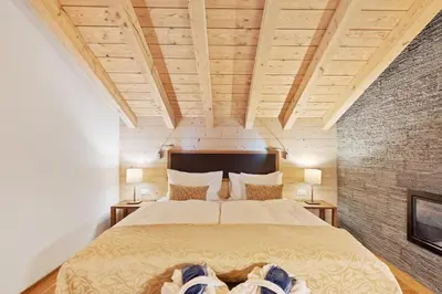 Ein Bett oder Betten in einem Zimmer der Unterkunft Grand Hotel Zermatterhof