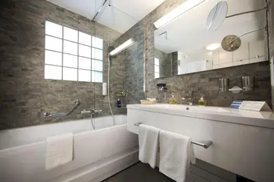 Ein Badezimmer in der Unterkunft Alpen Resort & Spa