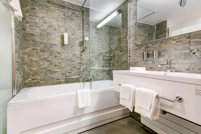 Ein Badezimmer in der Unterkunft Alpen Resort & Spa