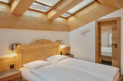 Ein Bett oder Betten in einem Zimmer der Unterkunft Hotel Antika