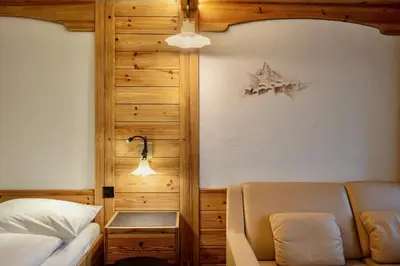Ein Bett oder Betten in einem Zimmer der Unterkunft Hotel Antika