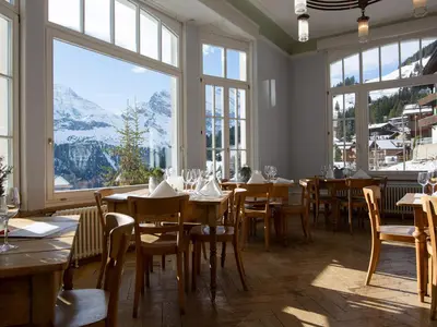 Ein Restaurant oder anderes Speiselokal in der Unterkunft Hotel Regina