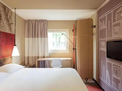 Ein Bett oder Betten in einem Zimmer der Unterkunft Ibis Sion