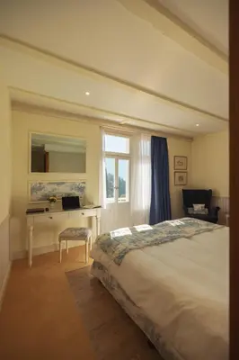 Ein Bett oder Betten in einem Zimmer der Unterkunft Hotel Regina