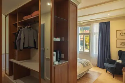 Ein Bett oder Betten in einem Zimmer der Unterkunft Hotel Regina