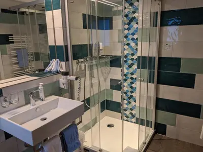 Ein Badezimmer in der Unterkunft Hotel Alpenblick Mürren
