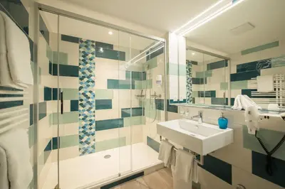 Ein Badezimmer in der Unterkunft Hotel Alpenblick Mürren