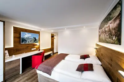 Ein Bett oder Betten in einem Zimmer der Unterkunft Hotel Butterfly