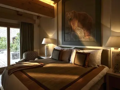 Ein Bett oder Betten in einem Zimmer der Unterkunft LeCrans