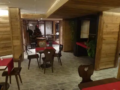 Ein Sitzbereich in der Unterkunft Hotel Zodiaque