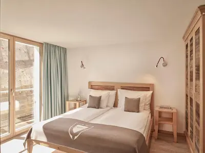 Ein Bett oder Betten in einem Zimmer der Unterkunft Firefly Luxury Suites