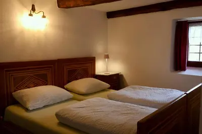 Ein Bett oder Betten in einem Zimmer der Unterkunft Antica Osteria Dazio