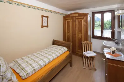 Ein Bett oder Betten in einem Zimmer der Unterkunft Antica Osteria Dazio