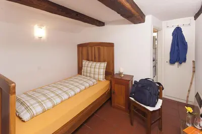Ein Bett oder Betten in einem Zimmer der Unterkunft Antica Osteria Dazio
