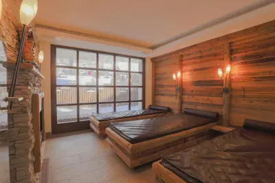 Ein Bett oder Betten in einem Zimmer der Unterkunft Hotel Alpin Superior