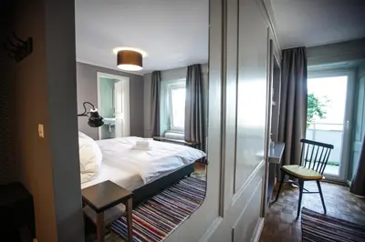 Ein Bett oder Betten in einem Zimmer der Unterkunft B&B Zum Schleif
