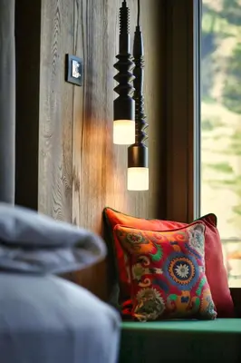 Ein Bett oder Betten in einem Zimmer der Unterkunft Hotel ZERMAMA Zermatt