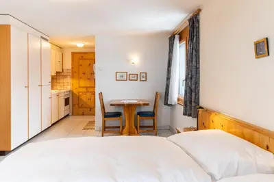 Ein Bett oder Betten in einem Zimmer der Unterkunft Haus Zer Weidu