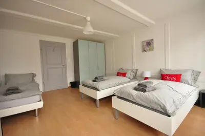 Ein Bett oder Betten in einem Zimmer der Unterkunft Townhouse II Sleeps 12 guests Central